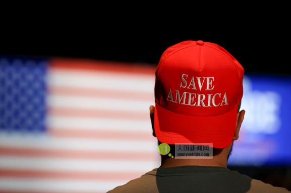 A supporter wears a 'Save America' hat during an election night watch party in Ohio, US